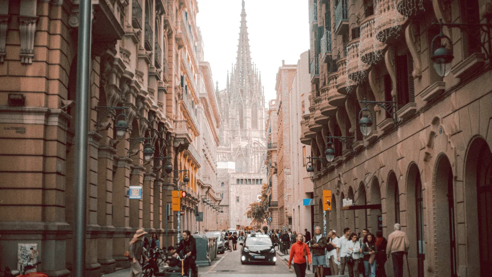 A historic street leading towards Barcelona Cathedral